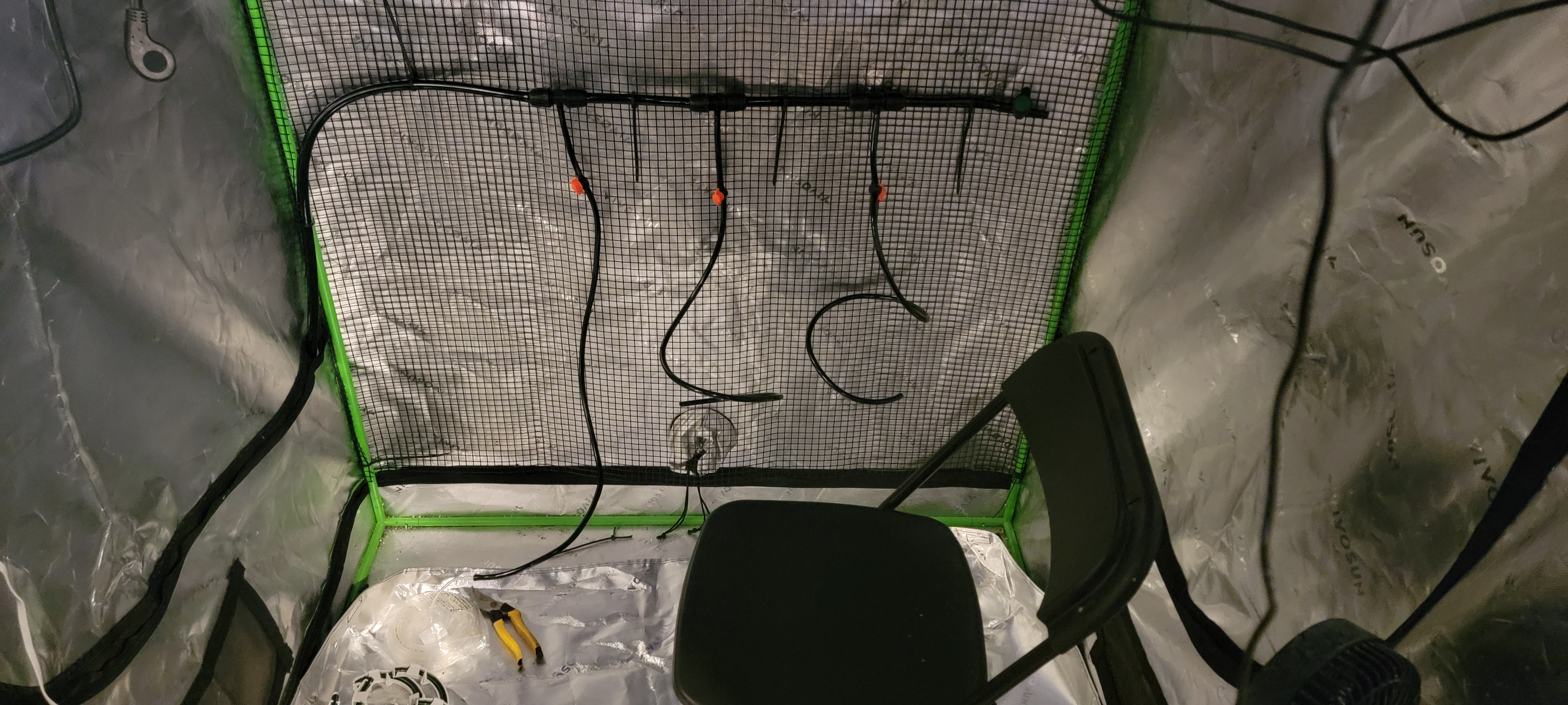 Tubing affixed to netting